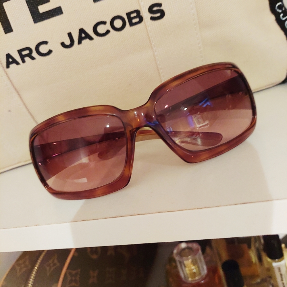 Prada Italy Brown tone shiny tortoise sunglasses